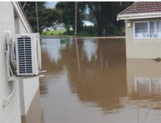 A flooded house with air conditioner

Description automatically generated