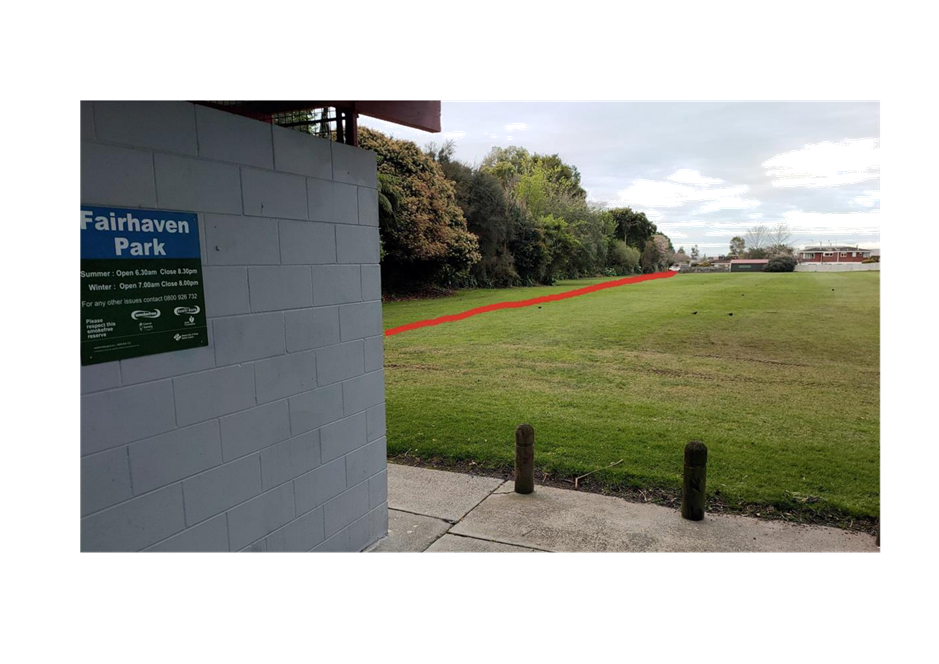 A brick wall with a sign on it

Description automatically generated