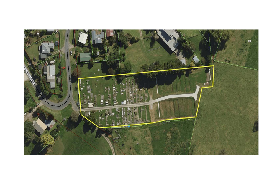 Aerial view of a cemetery

Description automatically generated