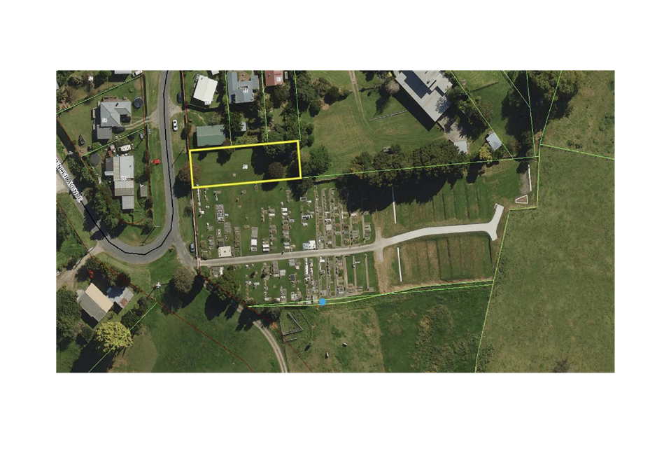 Aerial view of a cemetery

Description automatically generated