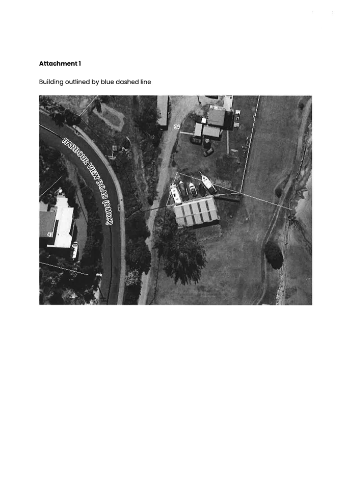 An aerial view of a road and buildings

Description automatically generated